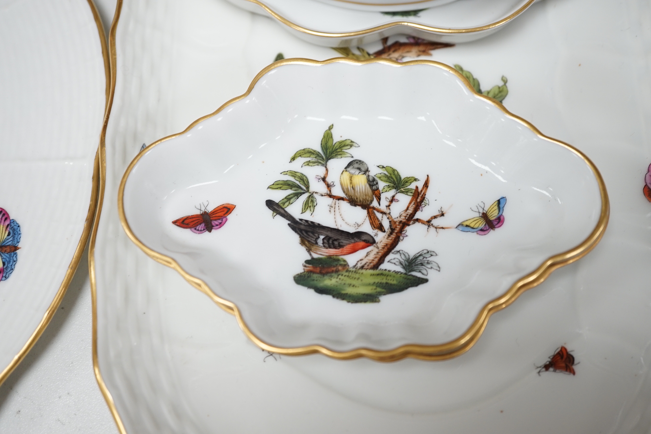 A group of Herend Rothschild 'birds' pattern decorative wares, and two Herend fruit pattern toast racks